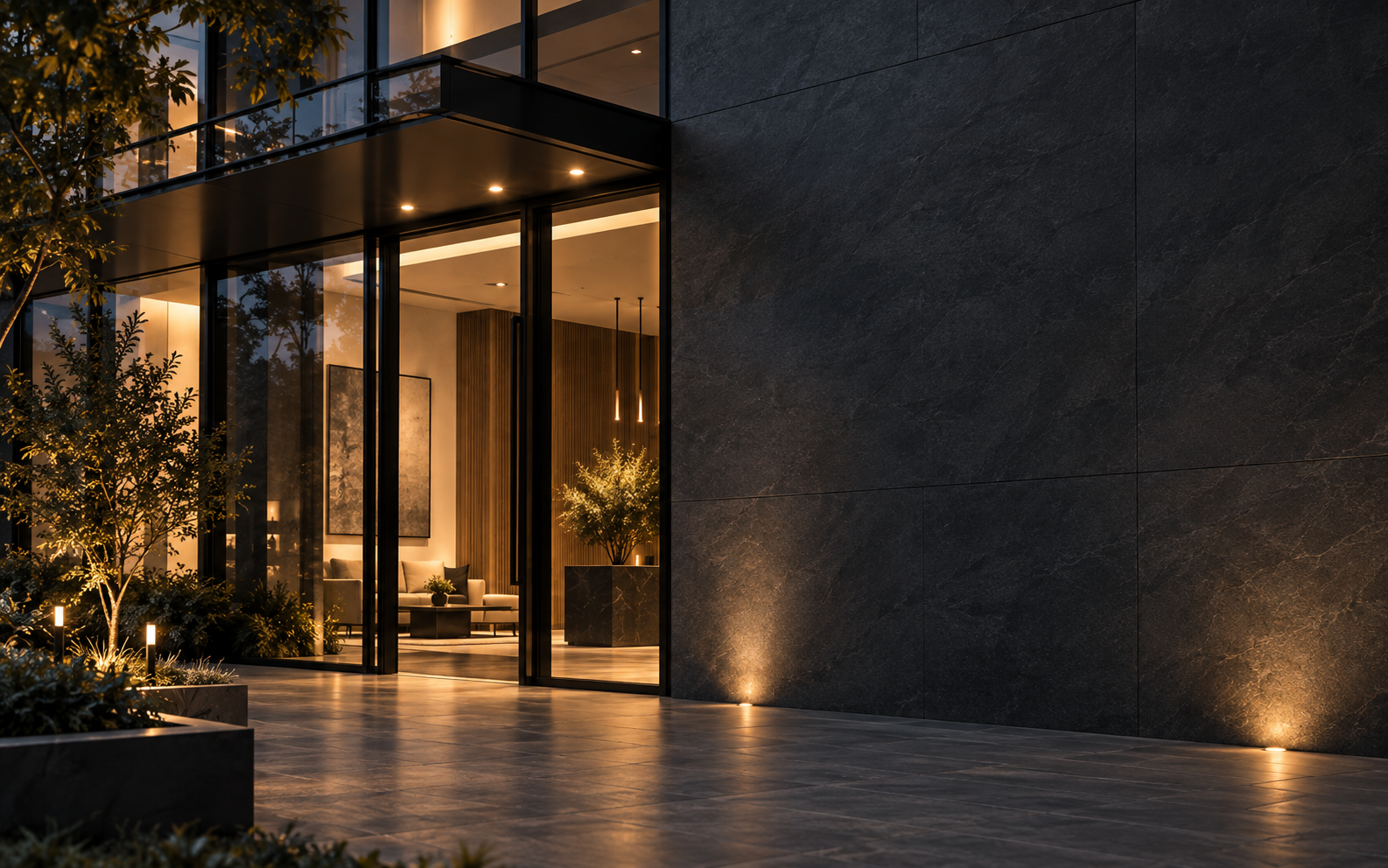 Conceptual architectural image of a contemporary glass entry and dark stone facade